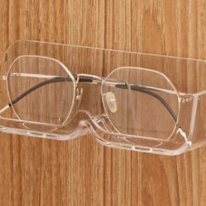 SUPORTE DE PAREDE PARA &Oacute;CULOS EM POLICARBONATO TRANSPARENTE